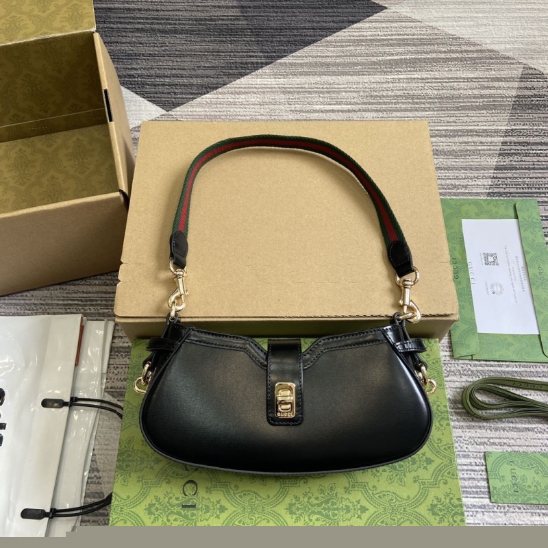 G*u*i top handle bags